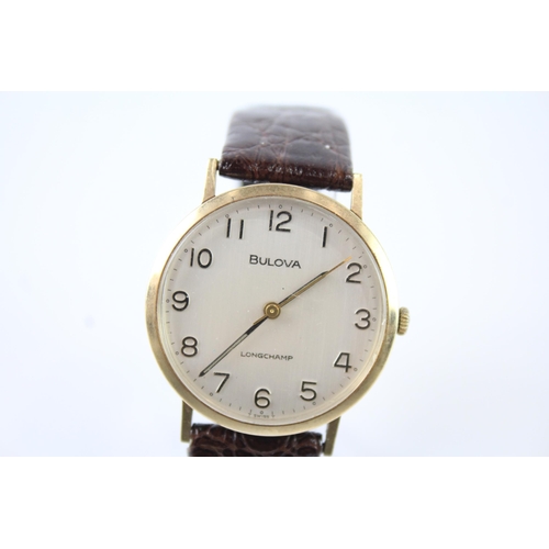 2124 - A 1970s Bulova Longchamp 9ct gold cased hand wind men's wristwatch