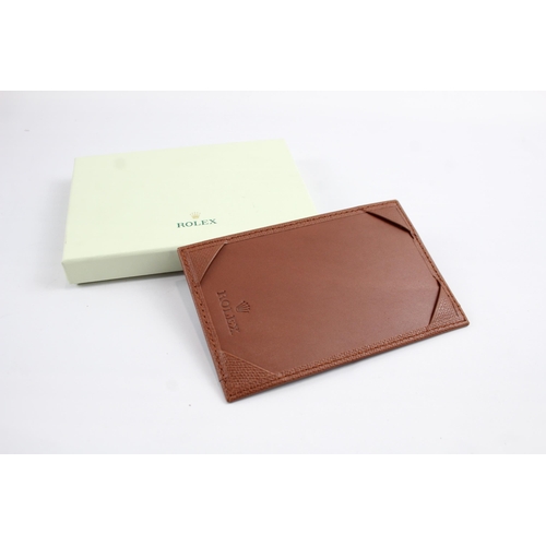 2138 - A boxed Rolex brown leather pocket notebook