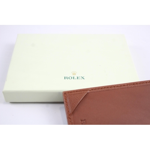 2138 - A boxed Rolex brown leather pocket notebook