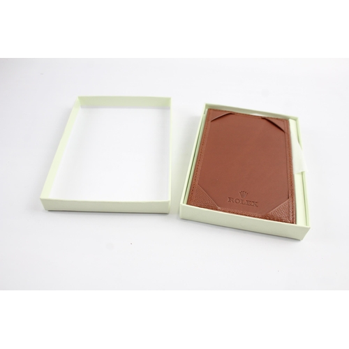 2138 - A boxed Rolex brown leather pocket notebook