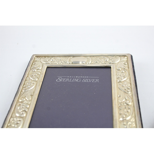 2169 - Two hallmarked sterling silver photograph frames - largest approx. 18cm x 14cm