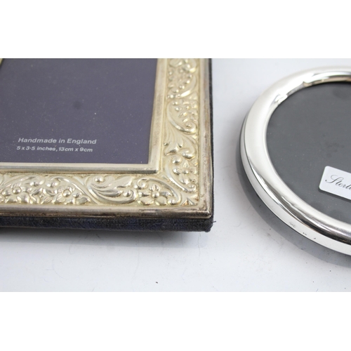 2169 - Two hallmarked sterling silver photograph frames - largest approx. 18cm x 14cm