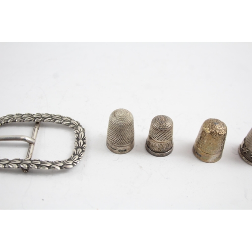 2177 - Seven pieces of silver, one .800 thimble, one .800 belt buckle and six hallmarked sterling silver th... 