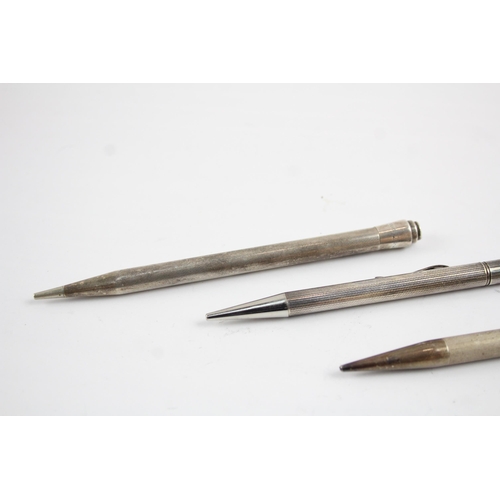 2198 - Four sterling silver pencils to include Lifelong etc. - approx. gross weight 75.2g