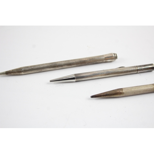 2198 - Four sterling silver pencils to include Lifelong etc. - approx. gross weight 75.2g