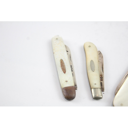 2199 - Three sterling silver knives with mother of pearl handles - approx. gross weight 47g