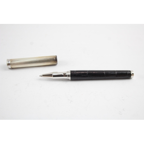 2200 - A boxed Aspinal of London sterling silver and leather ballpoint pen