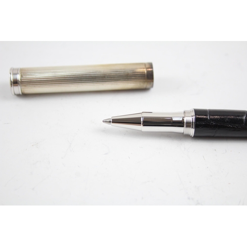 2200 - A boxed Aspinal of London sterling silver and leather ballpoint pen