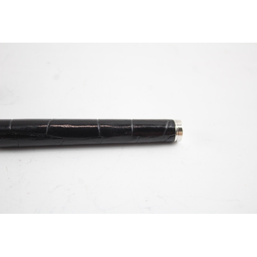 2200 - A boxed Aspinal of London sterling silver and leather ballpoint pen