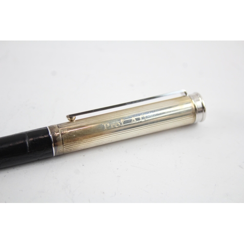 2200 - A boxed Aspinal of London sterling silver and leather ballpoint pen