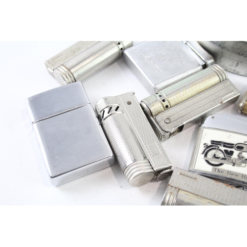 2205 - A collection of cigarette lighters to include silver plate, brass etc.