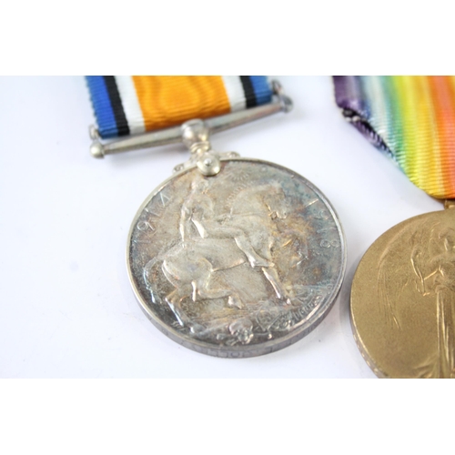 2228 - A WWI British medal pair presented to 208257 Gnr. F.L. Jolley R.A.