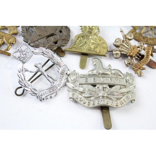 2230 - Ten military cap badges