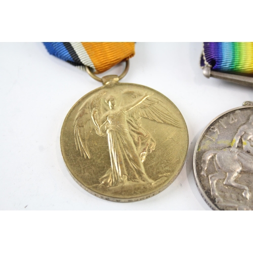 2242 - A WWI medal pair presented to 35603 Pte. W. Morris E. Surrey Regt.