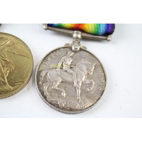 2242 - A WWI medal pair presented to 35603 Pte. W. Morris E. Surrey Regt.