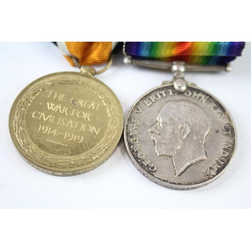 2242 - A WWI medal pair presented to 35603 Pte. W. Morris E. Surrey Regt.