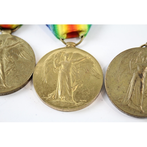 2246 - Four WWI Victory medals  presented to 27932 Pte. Crossley W. Yorks Regt, 45745 Pte. Smith Y&L etc.