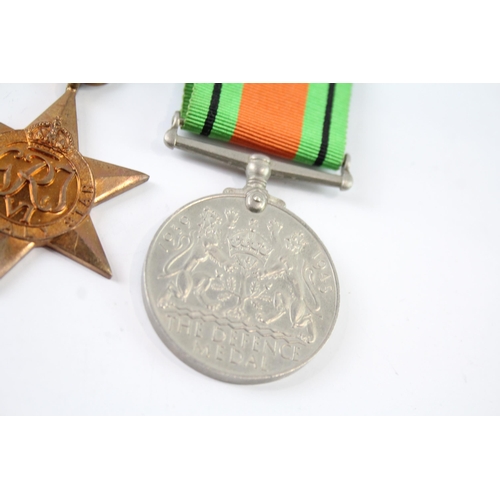 2247 - A boxed WWII medal group comprising The Burma Star, The Italy Star, The France and Germany Star, The... 