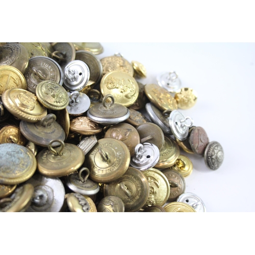 2251 - A collection of mixed uniform buttons to include military, police, fire and service etc.