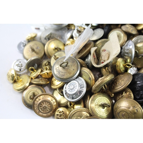 2251 - A collection of mixed uniform buttons to include military, police, fire and service etc.