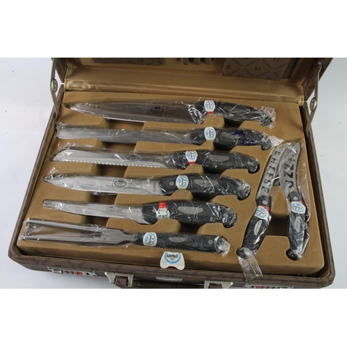 831A - A Kaiserbach carving knife and cutlery set with briefcase canteen