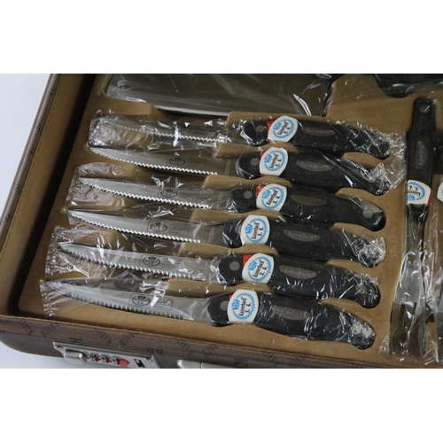 831A - A Kaiserbach carving knife and cutlery set with briefcase canteen