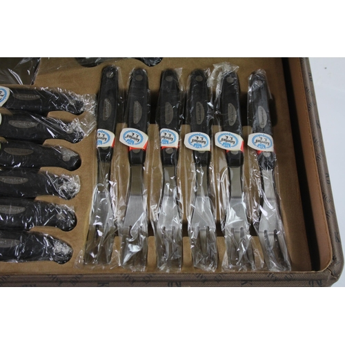 831A - A Kaiserbach carving knife and cutlery set with briefcase canteen