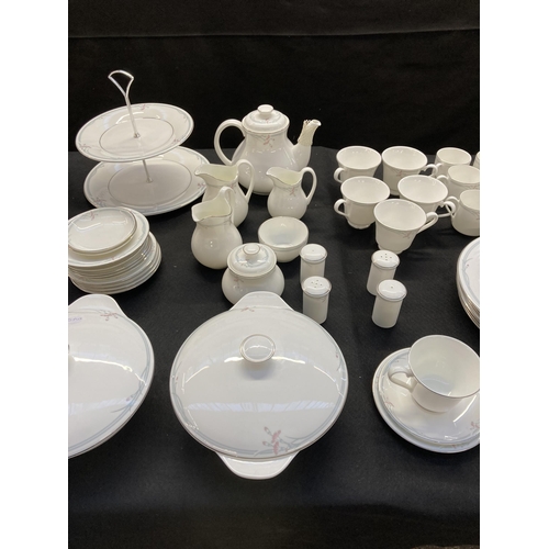 330 - Approx. eighty two pieces of Royal Doulton Carnation bone china to include six tea cups and saucers,... 