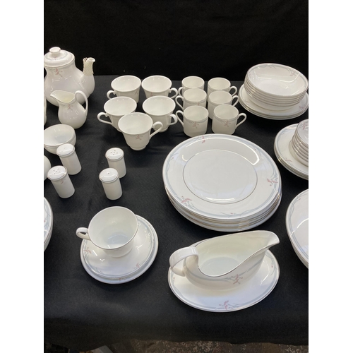 330 - Approx. eighty two pieces of Royal Doulton Carnation bone china to include six tea cups and saucers,... 