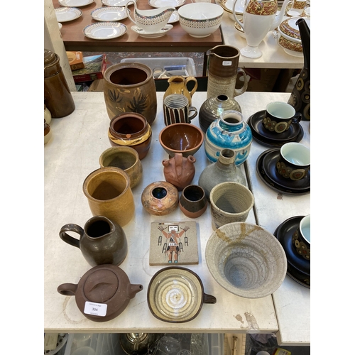 334 - A collection of 20th century ceramics to include Chinese Yixing clay teapot, studio pottery bottle n... 