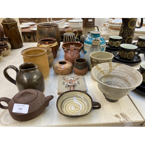 334 - A collection of 20th century ceramics to include Chinese Yixing clay teapot, studio pottery bottle n... 