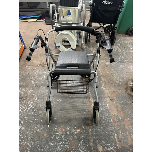 1025 - A 2GO Ability four wheeled walking frame with brakes