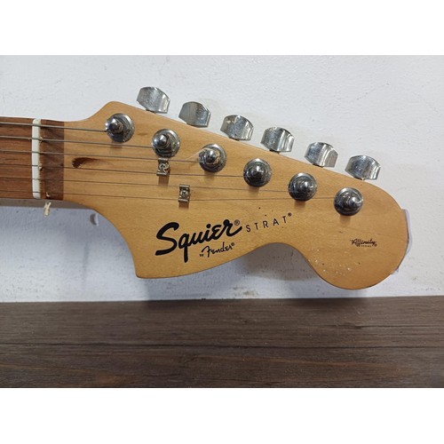 754 - A Squier Stratocaster electric guitar