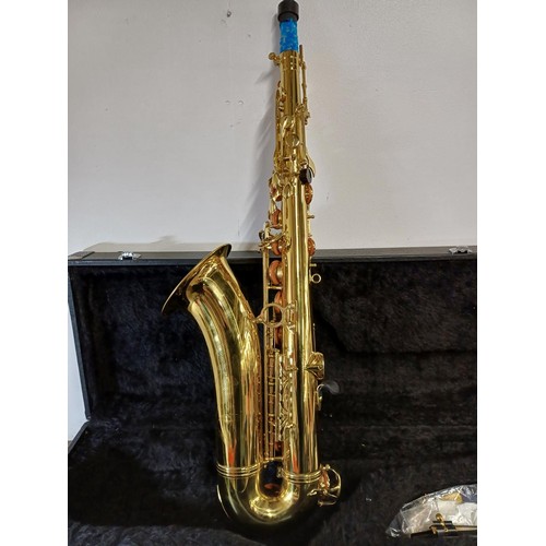 755 - A cased tenor saxophone with Selmer mouthpiece, pad saver, pull through and reeds