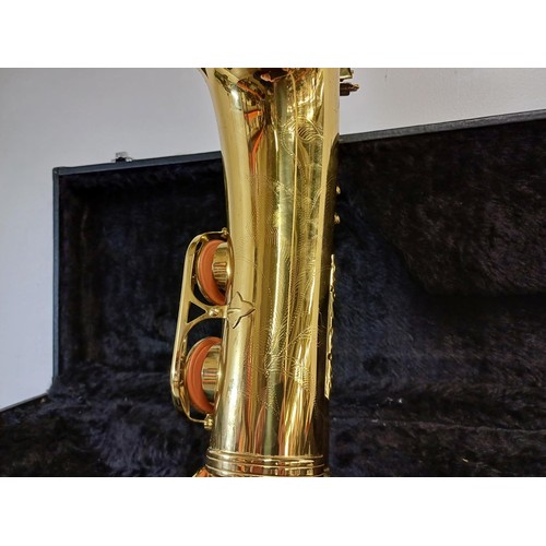 755 - A cased tenor saxophone with Selmer mouthpiece, pad saver, pull through and reeds