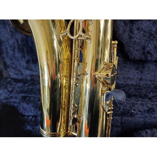 755 - A cased tenor saxophone with Selmer mouthpiece, pad saver, pull through and reeds