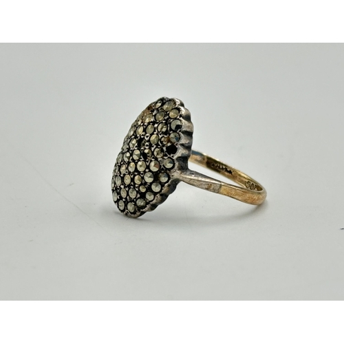 2071 - A 9ct gold and silver marcasite dress ring, size O - approx. gross weight 3.11g