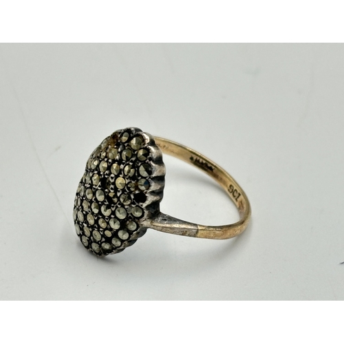 2071 - A 9ct gold and silver marcasite dress ring, size O - approx. gross weight 3.11g