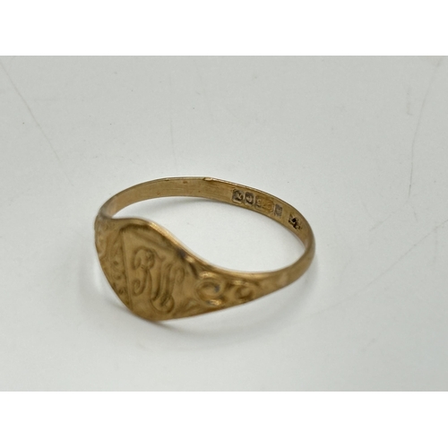 2076 - A hallmarked Birmingham 9ct gold signet ring, size P - approx. gross weight 1.67g