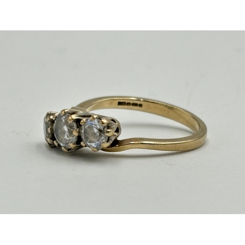 2087 - A hallmarked Birmingham 9ct gold CZ trilogy ring, size P - approx. gross weight 3.5g