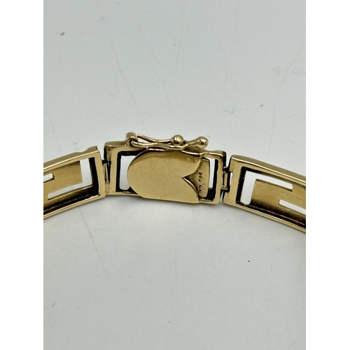 2098 - A 14ct gold Greek key panel bracelet - approx. gross weight 23.85g