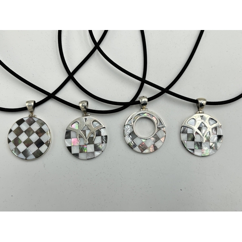 2101D - Four cased .925 silver mother of pearl pendant necklaces