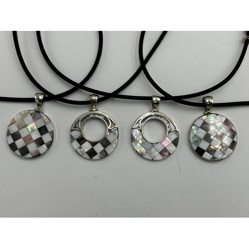 2101E - Four cased .925 silver mother of pearl pendant necklaces