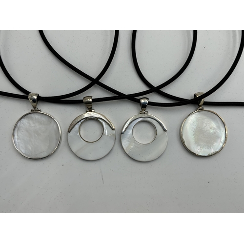 2101E - Four cased .925 silver mother of pearl pendant necklaces