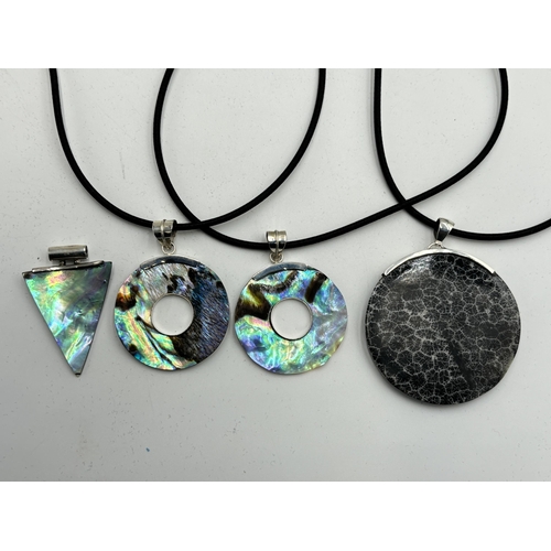 2101G - Four cased .925 silver pendant necklaces to include three abalone shell etc.