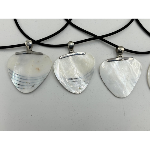 2101H - Six cased .925 silver mother of pearl pendant necklaces