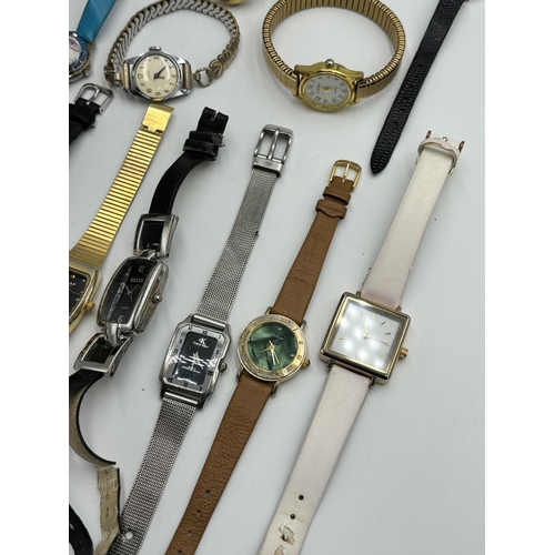 2137 - A collection of lady's quartz wristwatches to include Calvin Klein, Timex etc.