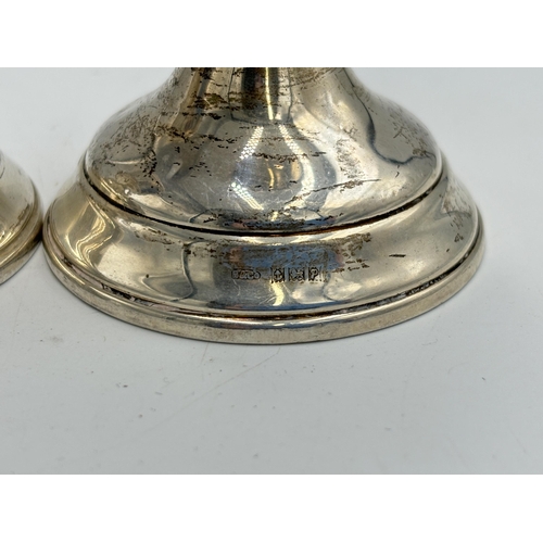 2151 - A pair of W I Broadway & Co hallmarked Birmingham silver weighted candlesticks, dated 1964 - approx.... 