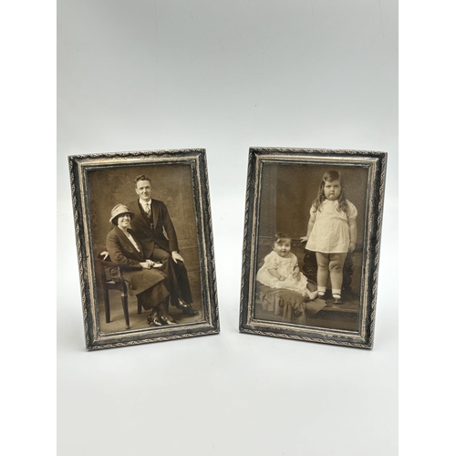 2154 - A pair of hallmarked Birmingham silver photo frames - approx. 14.5cm high x 10.5cm wide