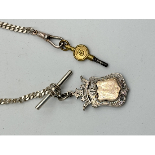 2155 - A hallmarked Birmingham silver watch fob, dated 1911 with stamped .925 silver albert chain - approx.... 